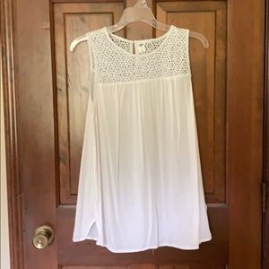 Sleeveless blouse with lace yoke